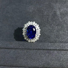 Load image into Gallery viewer, 10 Carat Oval Cut Lab Grown Sapphire Snowflake Halo Ring