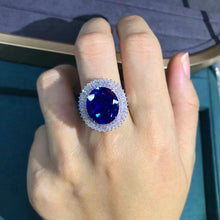 Load image into Gallery viewer, 20 Carat Oval Cut Blue Lab Grown Sapphire Snowflake Halo Ring