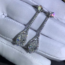 Load image into Gallery viewer, 3 Carat Pear Cut K-M Colorless Halo Moissanite Dangling Earrings