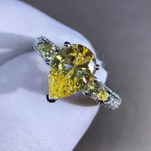 Load image into Gallery viewer, 2 Carat Pear Cut Moissanite Ring Vivid Yellow VVS Three Stones Basket Bead-set