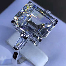 Load image into Gallery viewer, 5 Carat Emerald Cut Moissanite Ring Vivid Yellow VVS Three Stone Basket