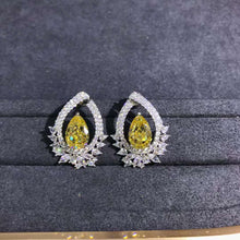 Load image into Gallery viewer, 4 Carat Pear Cut Floating Halo VVS Moissanite Stud Earrings