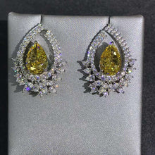 Load image into Gallery viewer, 4 Carat Pear Cut Floating Halo VVS Moissanite Stud Earrings