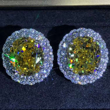 Load image into Gallery viewer, 15 Carat TW Yellow Oval Cut Halo VVS Moissanite Stud Earrings
