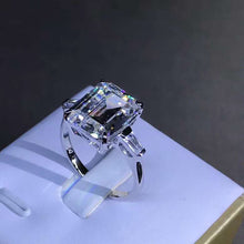 Load image into Gallery viewer, 5 Carat Emerald Cut Moissanite Ring Three Stone Basket VVS G-H Colorless