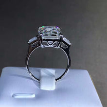 Load image into Gallery viewer, 5 Carat Emerald Cut Moissanite Ring Three Stone Basket VVS G-H Colorless